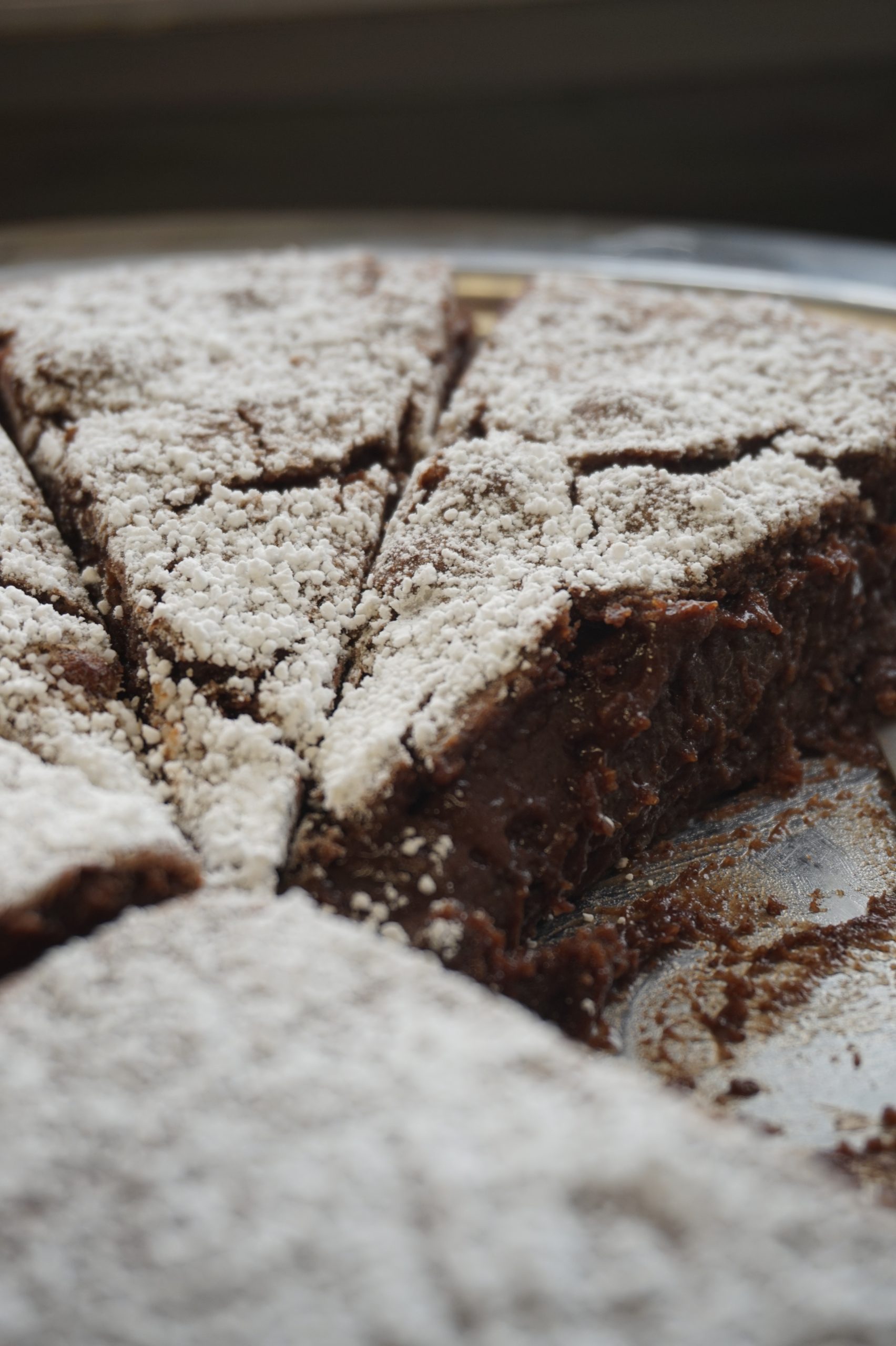 Chocolate cake slices with powdered sugar