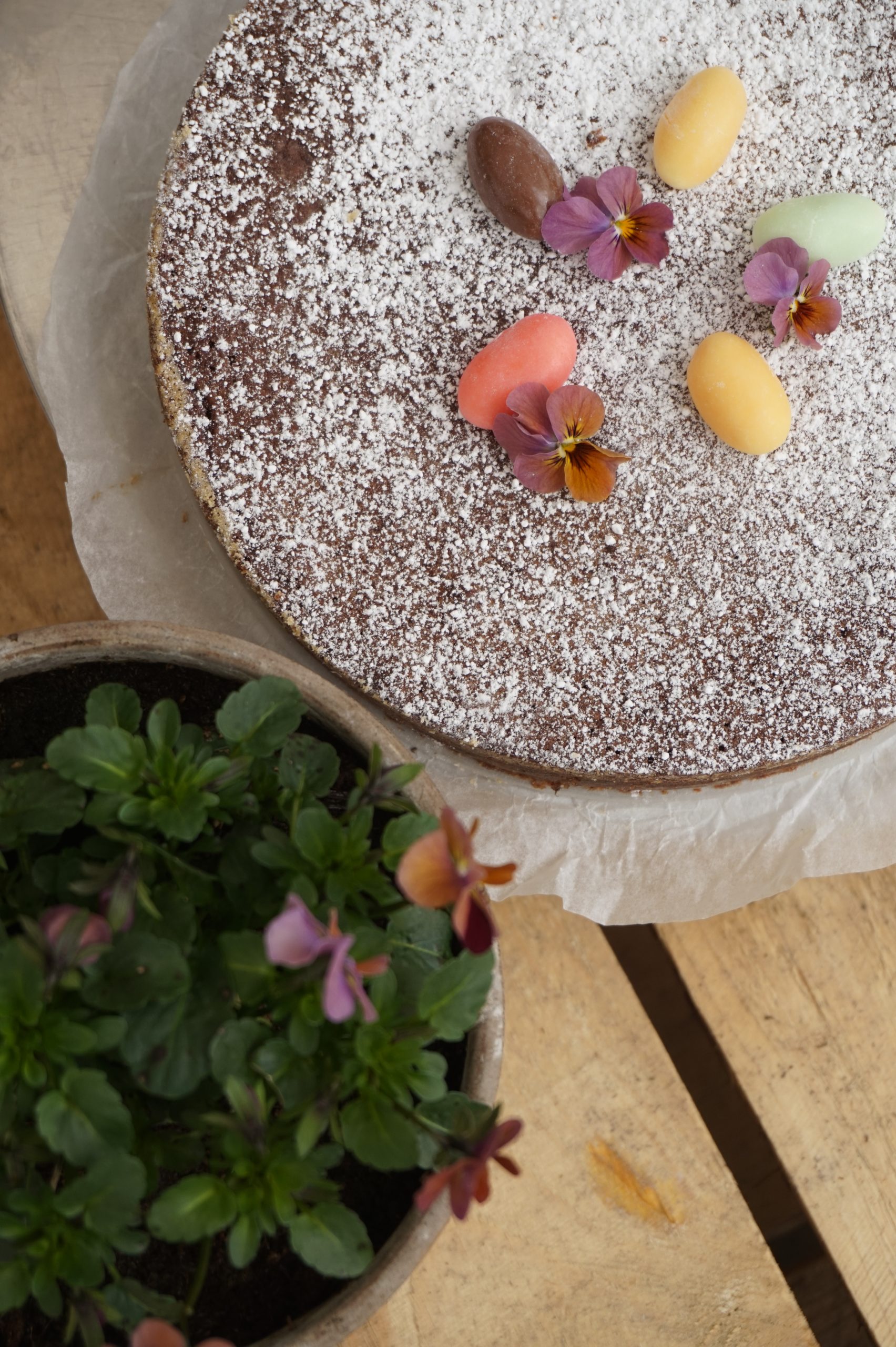 Chocolate cake with flowers and eggs